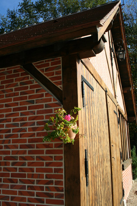 Garage finition corbeau et remplissage briquettes